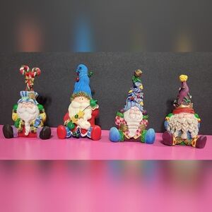 Cracker Barrel Set Of 4 Sitting Santa Figurines